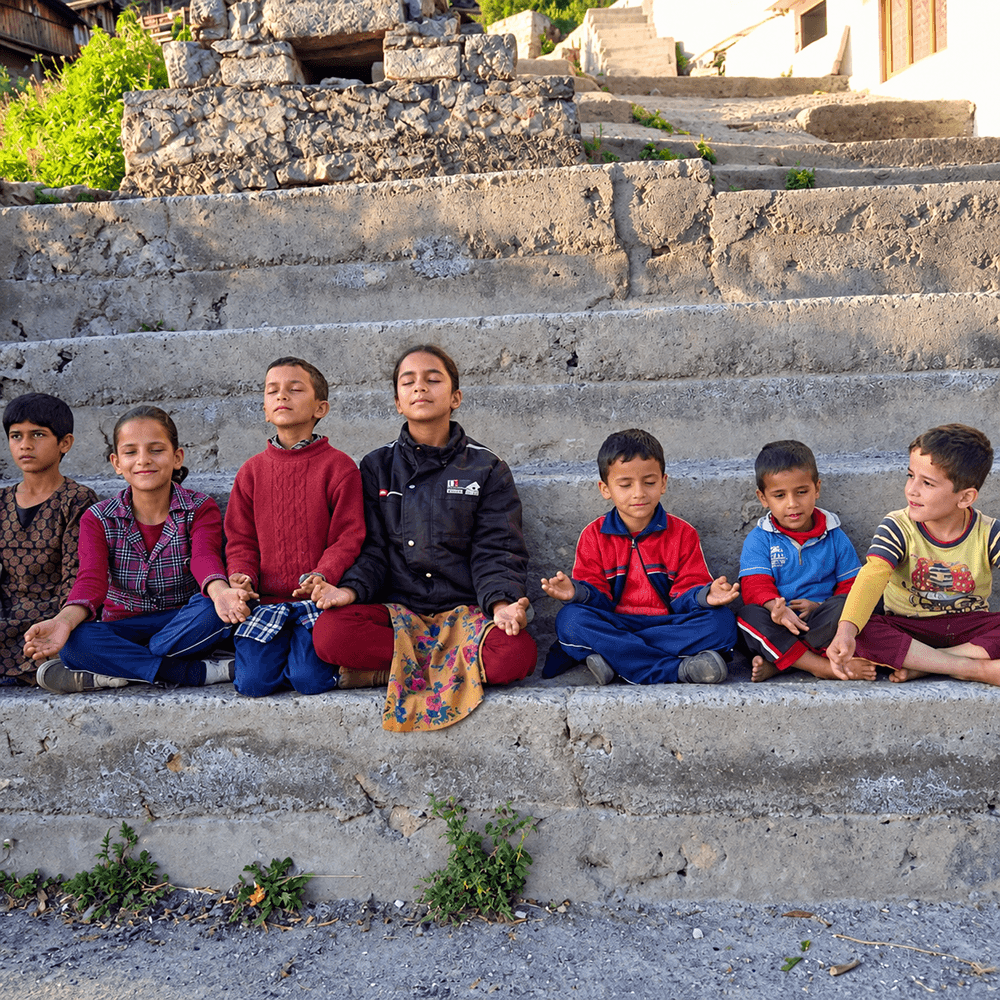 Children and families gathered together, cared for and nourished at a community programme.
